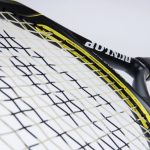 Racket Review Lead Art