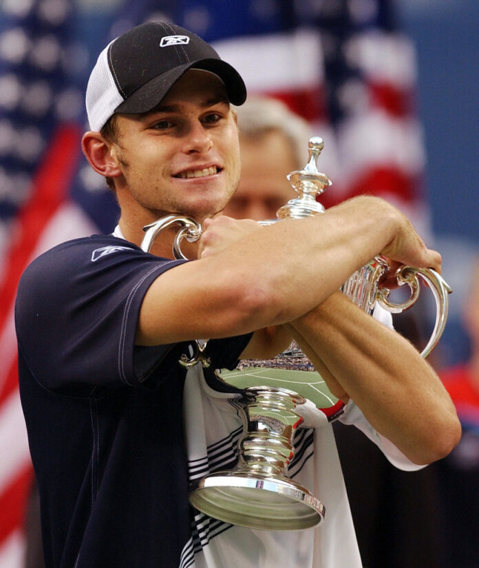 Andy Roddick of the United States hugs t
